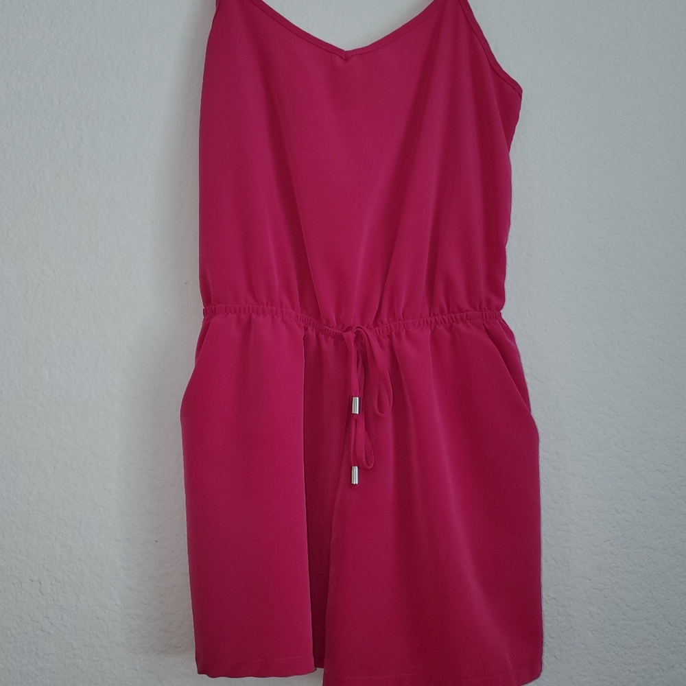 Pink romper.